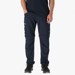 Spodnie outdoor hiking męskie Swedemount Glittertind Zip-Off Pants szybkoschnące. Niebieskie spodnie sportowe męskie SWEDEMOUNT, m, bez wzorów, z tkaniny, outdoorowe. Za 329.99 zł.