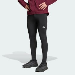 Legginsy adi365 Running Essentials Winterized. Czarne legginsy sportowe męskie Adidas, l, bez wzorów, z dzianiny, długie, do biegania, climawarm (adidas). Za 259.00 zł.