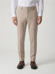 Spodnie chino slim fit - beżowy. Brązowe spodnie materiałowe męskie Reserved, l, bez wzorów, z dzianiny. Za 139.99 zł.