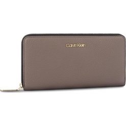 Duży Portfel Damski CALVIN KLEIN - Neat Large Zoparound K60K604603 002. Portfele damskie marki Calvin Klein. W wyprzedaży za 249.00 zł.