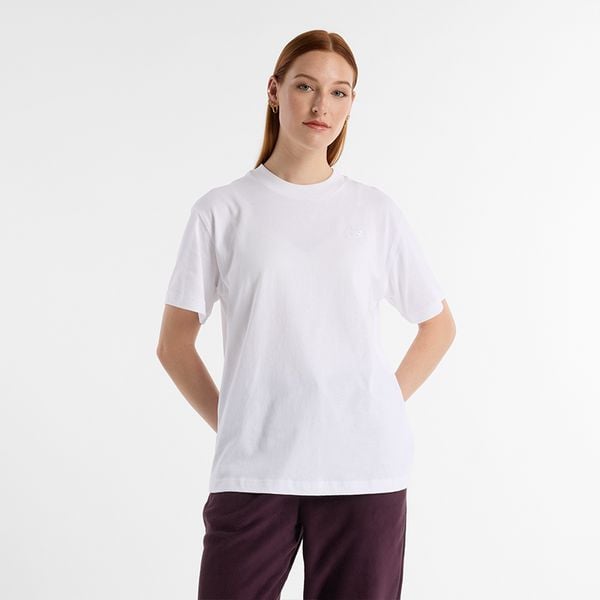Koszulka damska New Balance WT41501WT – biała. Białe koszulki sportowe damskie New Balance, s, bez wzorów, z materiału, eleganckie, bez kołnierzyka. Za 169.99 zł.