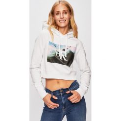 Calvin Klein Jeans - Bluza. Białe bluzy damskie Calvin Klein Jeans, l, bez wzorów, z bawełny, z kapturem. W wyprzedaży za 399.90 zł.
