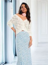 Spódnica midi w kwiaty - wielobarwny. Spódnice damskie Sinsay, l, bez wzorów, ze skóry, midi. Za 39.99 zł.