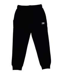 Foliowe spodnie dresowe dziewczęce. Czarne spodnie sportowe dla dziewczynek LEONE 1947 APPAREL, bez wzorów, z bawełny, na fitness i siłownię. Za 42.06 zł.