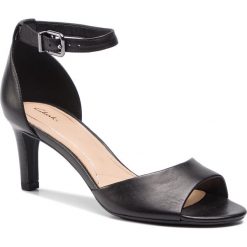 Sandały CLARKS - Laureti Grace 261401604 Black Leather. Czarne klapki damskie Clarks, bez wzorów, z materiału, bez obcasa, na obcasie. W wyprzedaży za 279.00 zł.