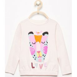 Koszulka z cekinową aplikacją - Różowy. T-shirty damskie marki bonprix. W wyprzedaży za 14.99 zł.