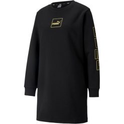 Bluza damska długa sportowa Puma Holiday. Czarne bluzy damskie Puma, s, bez wzorów, bez kaptura. W wyprzedaży za 129.00 zł.