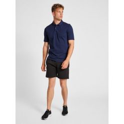 Polo Hummel Red Classic. Niebieskie buty sportowe męskie Hummel, z bawełny, bez zapięcia, na golfa. Za 150.00 zł.