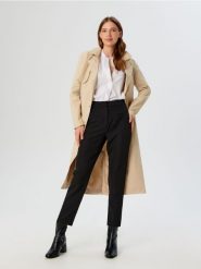 Spodnie eleganckie - czarny. Czarne spodnie materiałowe damskie Sinsay, l, bez wzorów. Za 39.99 zł.
