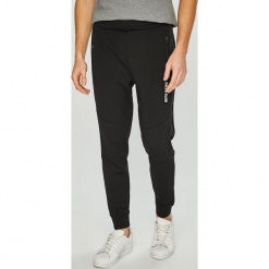 Calvin Klein Performance - Spodnie. Szare spodnie sportowe męskie marki Calvin Klein Performance, z dzianiny. Za 499.90 zł.