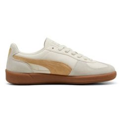 Damskie tenisówki Puma. Białe trampki i tenisówki damskie Puma, bez wzorów, z materiału, eleganckie, bez zapięcia. Za 554.99 zł.