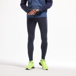 Legginsy do biegania męskie Kiprun Run 500 Warm ocieplane. Niebieskie legginsy sportowe męskie KIPRUN, m, bez wzorów, z elastanu, do biegania. W wyprzedaży za 99.99 zł.