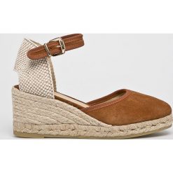 Badura - Koturny. Brązowe klapki damskie Badura, bez wzorów, z gumy, bez obcasa, na koturnie, bez zapięcia. W wyprzedaży za 259.90 zł.