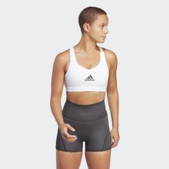 PowerReact Train Medium-Support Bra. Białe obuwie sportowe damskie Adidas, bez wzorów, z materiału, na fitness i siłownię. Za 159.00 zł.