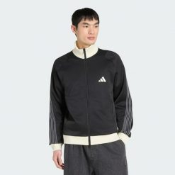 BLUZA DRESOWA Z PIKI O STANDARDOWYM KROJU STADIUM. Czarne bluzy sportowe męskie Adidas, uniwersalny, bez wzorów, z bawełny, bez kaptura. Za 349.00 zł.