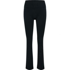 Damskie legginsy Hummel Hiit Seamless Flare. Czarne legginsy sportowe damskie Hummel, bez wzorów, długie. Za 273.00 zł.