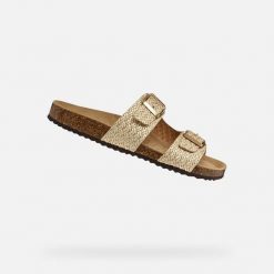 Sandały GEOX D BRIONIA Beżowy. Żółte sandały damskie Geox, bez wzorów, ze skóry, bez obcasa, bez zapięcia. Za 314.99 zł.
