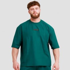 Koszulka męska fitness oversize Unstoppable. Zielone koszulki sportowe męskie GYMBEAM, m, bez wzorów, z bawełny, bez kołnierzyka, bez ramiączek, na fitness i siłownię. Za 69.90 zł.