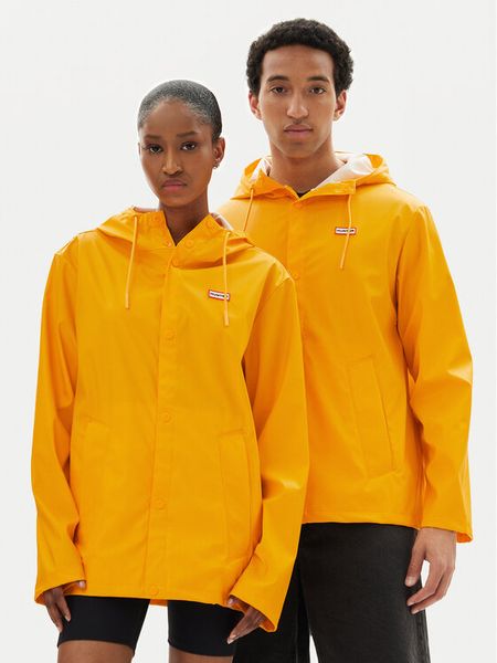 Hunter Kurtka przeciwdeszczowa Izzy Unisex HARU0012251 Żółty Regular Fit. Żółte kurtki damskie Hunter, l, bez wzorów, z syntetyku, bez kaptura. Za 239.99 zł.