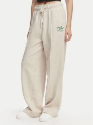 Tommy Hilfiger Spodnie dresowe Logo Exaggerated Seam WW0WW50783 Kremowy Relaxed Fit. Białe spodnie dresowe damskie Tommy Hilfiger, s, bez wzorów, z bawełny. Za 649.99 zł.