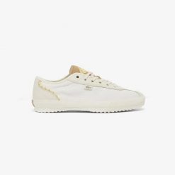 Buty Damskie Lacoste Backslam 126 2 CFA. Białe obuwie sportowe damskie Lacoste, bez wzorów, z jeansu, trekkingowe. Za 409.20 zł.