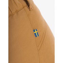 Spodnie outdoorowe damskie Fjallraven Stina Trousers. Brązowe spodnie sportowe damskie Fjällräven, l, bez wzorów, trekkingowe. Za 682.95 zł.