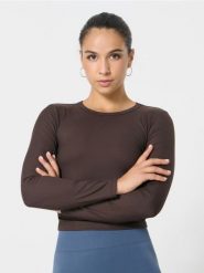 Koszulka sportowa z długimi rękawami - brązowy. Brązowe koszulki sportowe damskie Sinsay, l, bez wzorów, bez kołnierzyka, bez ramiączek. Za 29.99 zł.