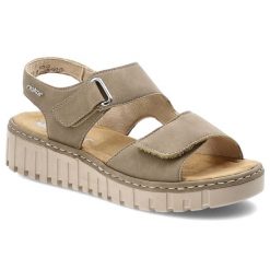 Sandały damskie Rieker, cholewka ze skóry ekologicznej z materiałowym wnętrzem zapinane na rzep, beżowe, V1382-64. Brązowe klapki damskie Rieker, bez wzorów, z materiału, bez obcasa. Za 319.00 zł.