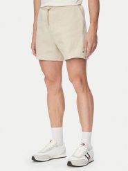 Tommy Jeans Szorty sportowe DM0DM21931 Beżowy jasny Regular Fit. Brązowe krótkie spodenki sportowe męskie Tommy Jeans, m, bez wzorów, z bawełny. Za 189.99 zł.