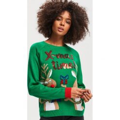 Sweter ze świątecznym motywem - Zielony. Zielone swetry damskie Reserved. Za 79.99 zł.