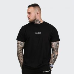 Koszulka męska fitness regular czarna FIT. Czarne koszulki sportowe męskie GYMBEAM, l, bez wzorów, z bawełny, bez kołnierzyka, bez ramiączek, na fitness i siłownię. Za 68.90 zł.