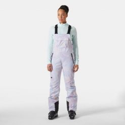 Damski kombinezon narciarski Helly Hansen Legendary Bib. Fioletowe spodnie materiałowe damskie Helly Hansen, bez wzorów. W wyprzedaży za 931.00 zł.