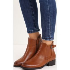 Brązowe Botki Dominium. Brązowe botki damskie Born2be, z okrągłym noskiem, bez obcasa, na płaskiej podeszwie, bez zapięcia. Za 119.99 zł.