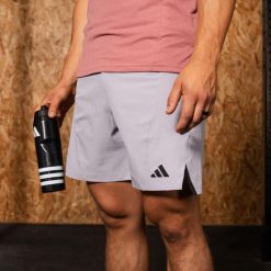 Spodenki fitness męskie ADIDAS. Szare krótkie spodenki sportowe męskie Adidas, m, bez wzorów, z elastanu, na fitness i siłownię. Za 119.99 zł.