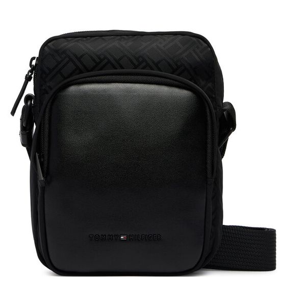 Saszetka Tommy Hilfiger. Czarne saszetki męskie Tommy Hilfiger, z nylonu, młodzieżowe, małe. Za 369.99 zł.