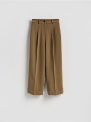 Spodnie culotte - oliwkowy. Zielone spodnie materiałowe damskie Reserved, l, bez wzorów, z tkaniny. Za 159.99 zł.