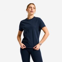 Koszulka fitness damska Domyos. Niebieskie koszulki sportowe damskie DOMYOS, xl, bez wzorów, z bawełny, bez kołnierzyka, bez ramiączek, na fitness i siłownię. Za 12.49 zł.