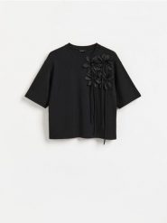 T-shirt z bawełną - czarny. Czarne t-shirty damskie Reserved, l, bez wzorów, z bawełny, bez kołnierzyka. Za 89.99 zł.