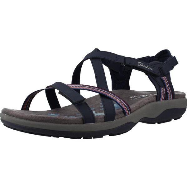 Sandały SKECHERS 163115S Niebieski. Niebieskie sandały damskie Skechers, bez wzorów, z materiału, bez obcasa, bez zapięcia. Za 281.99 zł.