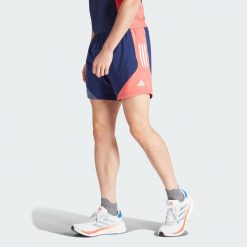 Szorty Own The Run Colorblock. Czerwone buty sportowe męskie Adidas, z materiału, bez zapięcia, na fitness i siłownię. W wyprzedaży za 136.05 zł.