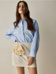 Spódnica z ozdobną aplikacją - złamana biel. Spódnice damskie Reserved, l, z aplikacjami, z tkaniny, dopasowane. Za 149.99 zł.