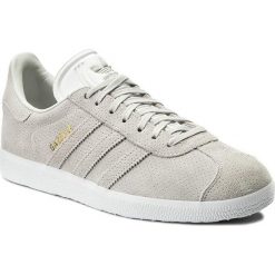 Buty adidas - Gazelle BZ0027 Greone/Greone/Goldmt. Obuwie sportowe damskie marki Adidas. W wyprzedaży za 259.00 zł.
