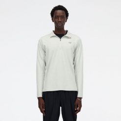 Bluza męska New Balance MT41915AG – szara. Szare bluzy sportowe męskie New Balance, m, bez wzorów, z materiału, bez kaptura, na fitness i siłownię. Za 259.99 zł.