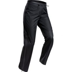 Spodnie turystyczne wierzchnie - MH500 WTP - damskie. Brązowe spodnie sportowe damskie QUECHUA, m, bez wzorów, z materiału, trekkingowe. Za 169.99 zł.