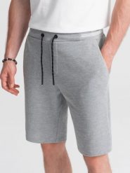 Ombre Dzianinowe szorty męskie z ozdobną gumka w pasie - szare V5 OM-SRCS-0110 XXL. Szare krótkie spodenki sportowe męskie Ombre, m, bez wzorów, z dzianiny. Za 59.99 zł.