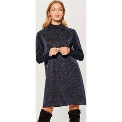 Sukienka z dekoltem na plecach - Czarny. Czarne sukienki damskie Mohito, z dekoltem na plecach. Za 129.99 zł.