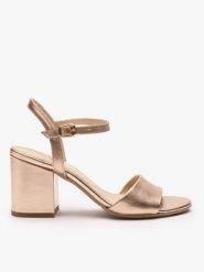 Platynowe sandały na obcasie. Brązowe sandały damskie Ryłko, bez wzorów, ze skóry, bez obcasa, na obcasie, bez zapięcia. Za 379.99 zł.