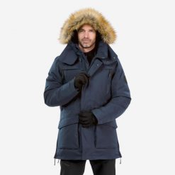 Parka turystyczna męska zimowa Quechua NH900 -20°C wodoodporna. Niebieskie kurtki męskie QUECHUA, na zimę, m, bez wzorów, z syntetyku, sportowe, bez kaptura. Za 499.99 zł.