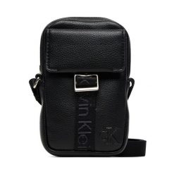 Saszetka Calvin Klein. Czarne saszetki męskie Calvin Klein, młodzieżowe, małe. Za 189.99 zł.
