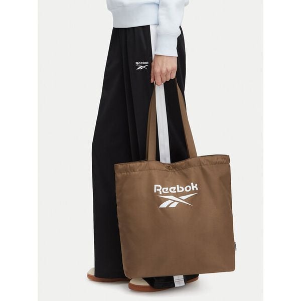 Torebka Reebok. Brązowe torebki do ręki damskie Reebok, bez wzorów, bez dodatków. Za 69.99 zł.
